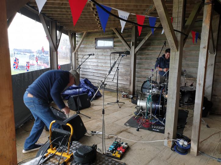 Dave setting up sound system