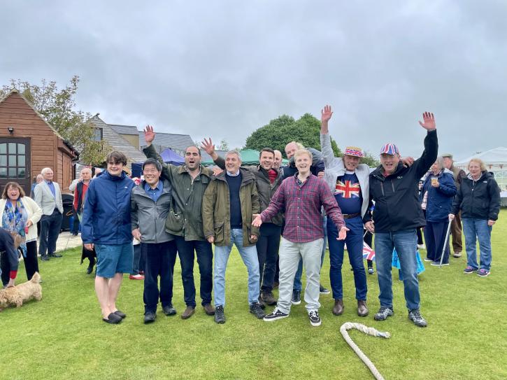 Winning mens tug of war team